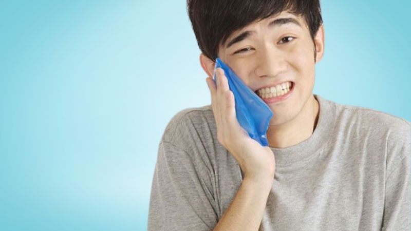 cách giảm đau sau  khi nhổ răng khôn hàm dưới