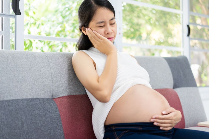 nguyên nhân đau răng khôn khi mang thai